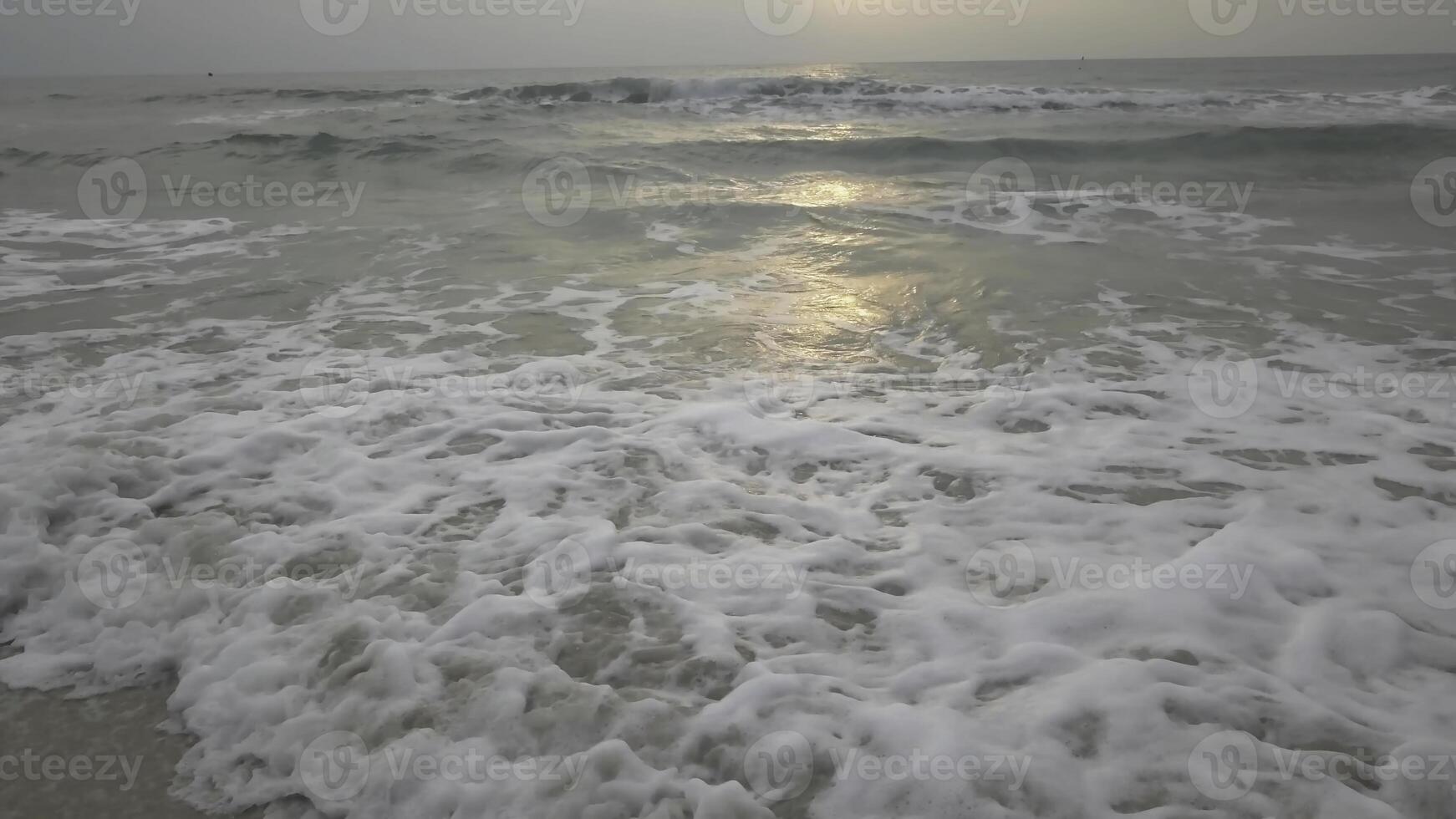 Sunset Twilight Dusk Beach Wave Sun. Video. Incredibly beautiful sunset on the beach in Thailand. Sun, sky, sea, waves and sand. A holiday by the sea photo