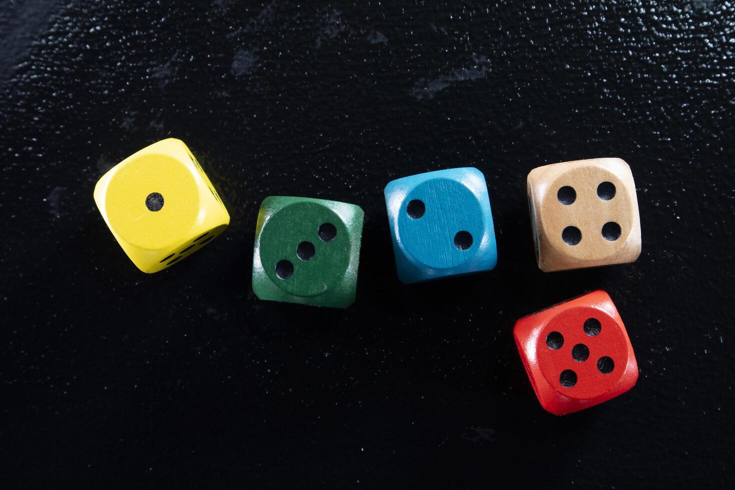 Set of colored playing dice photo