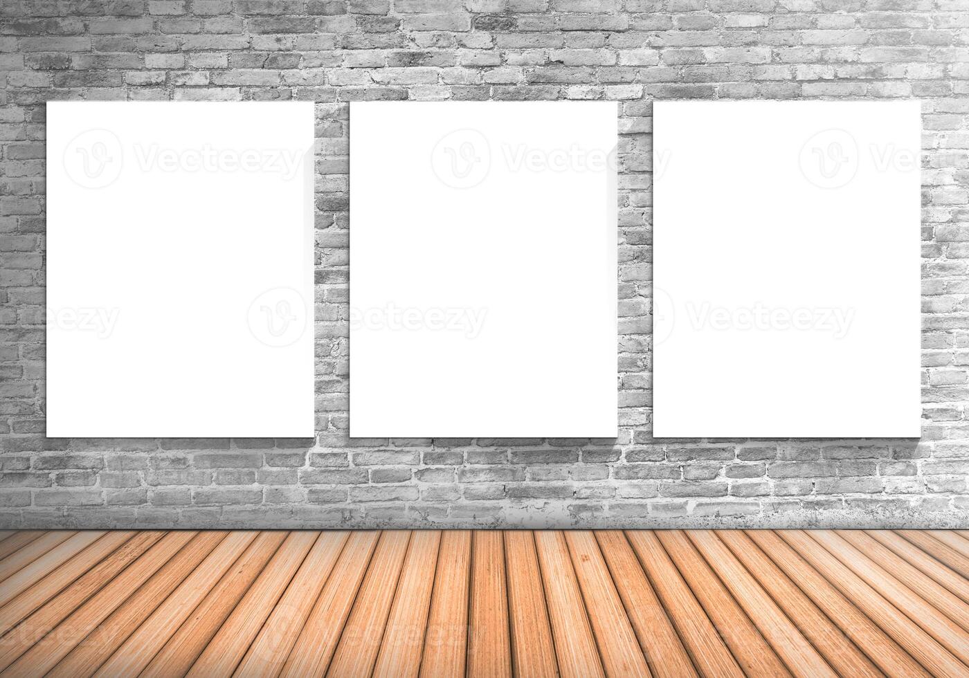 Blank frame three white board on a concrete blick wall and wooden floor photo