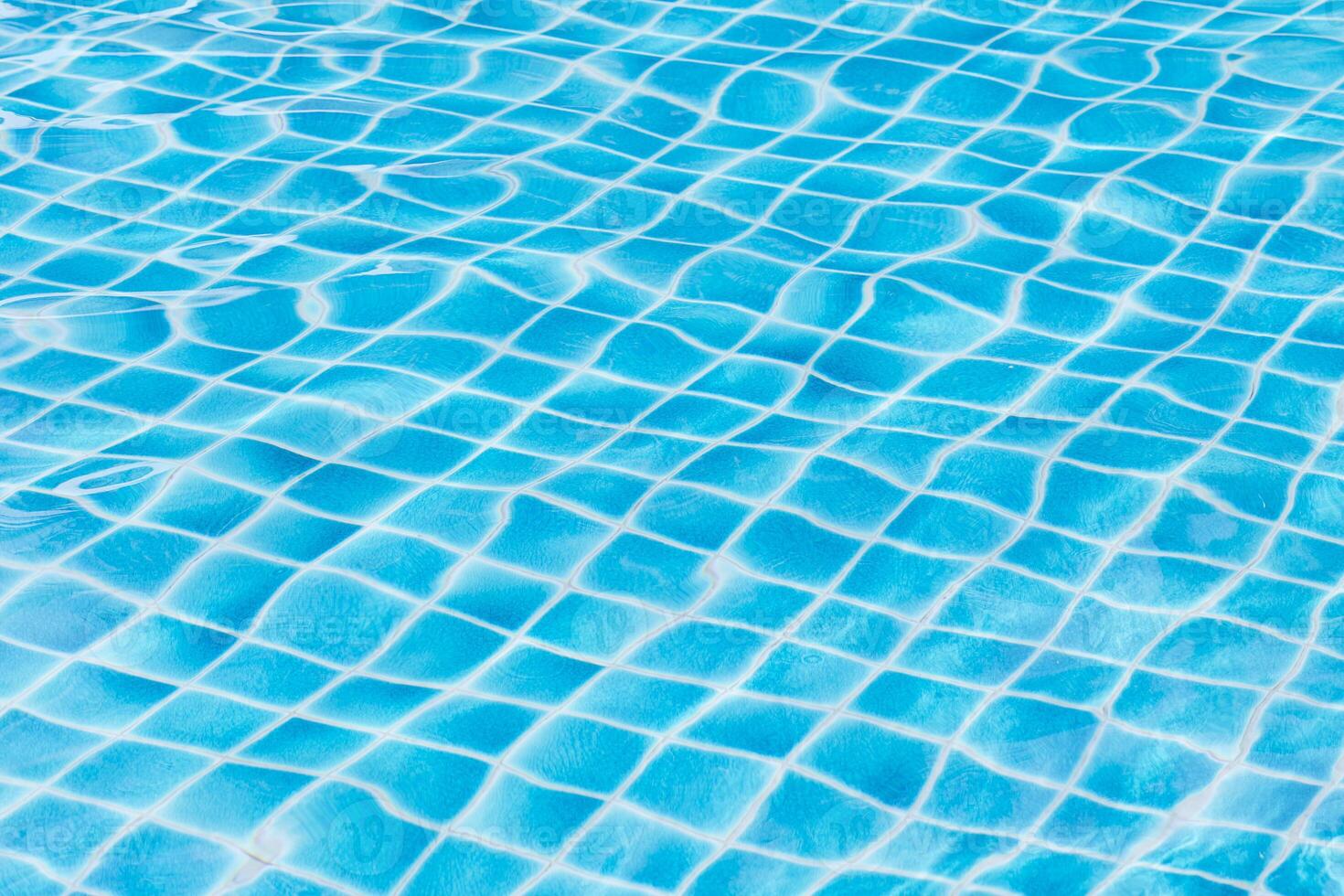 Blue sky swimming pool water texture reflection. photo