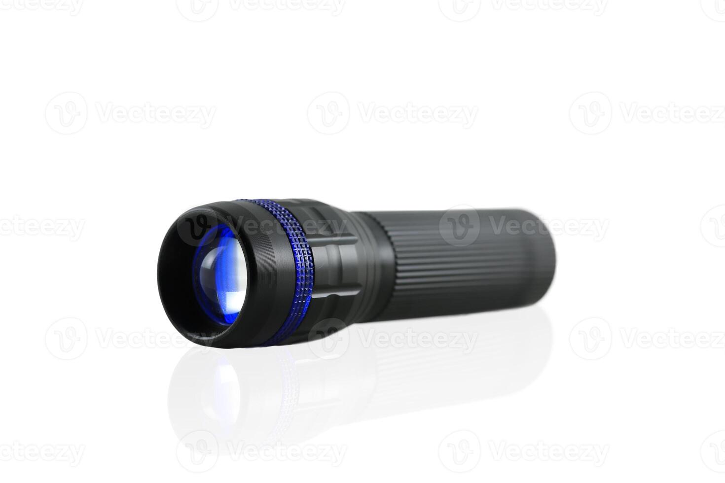 Blue Flashlight isolated on white background. photo