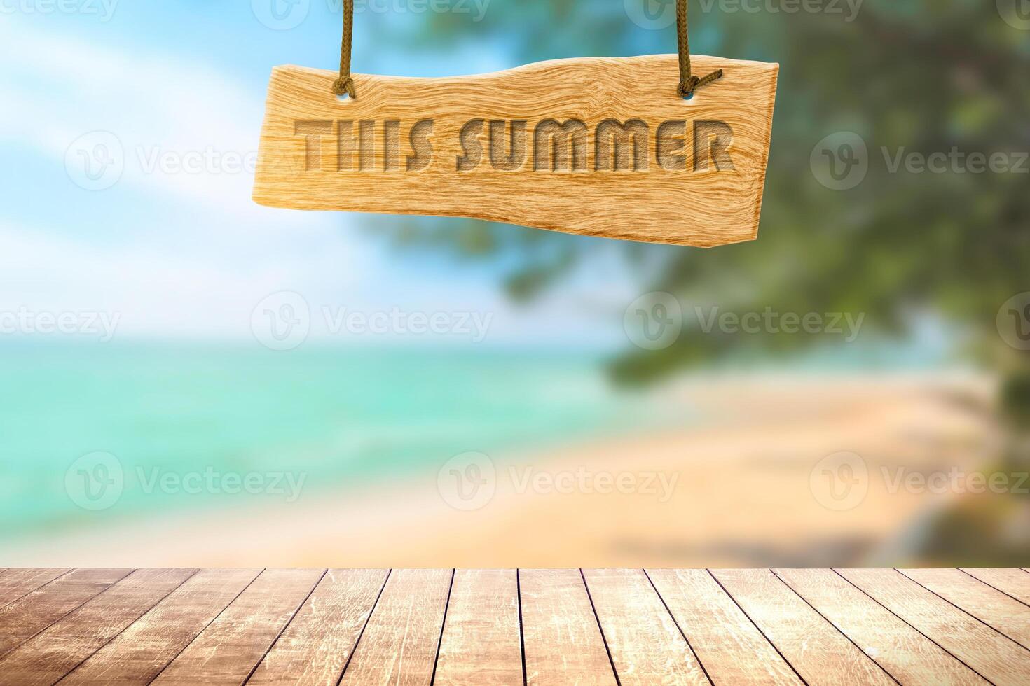 Wooden signboard with beautiful sand sea in summer. photo