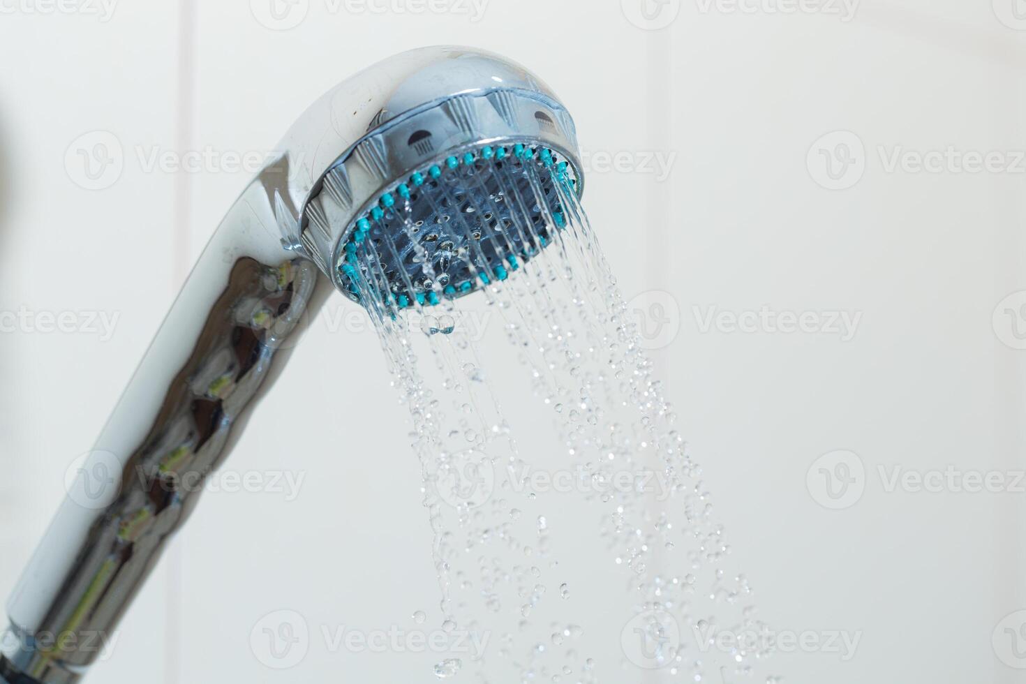 Shower with water steam in the bathroom. photo