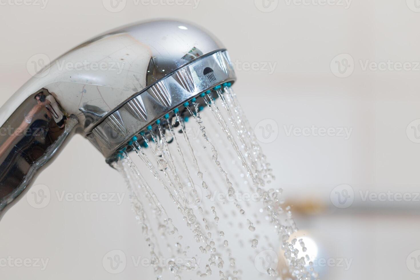 Shower with water steam in the bathroom. photo