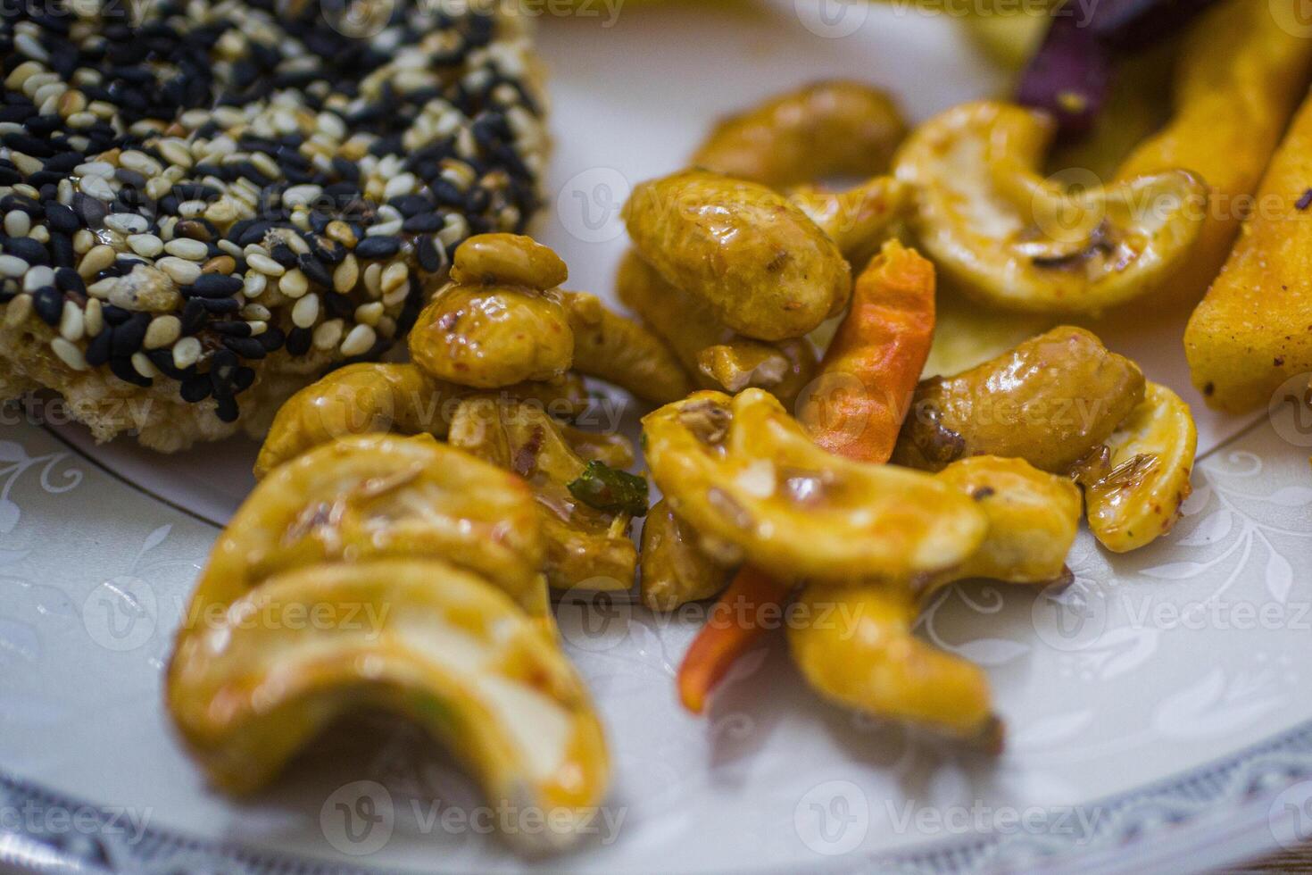 Thai snacks in a white plate photo