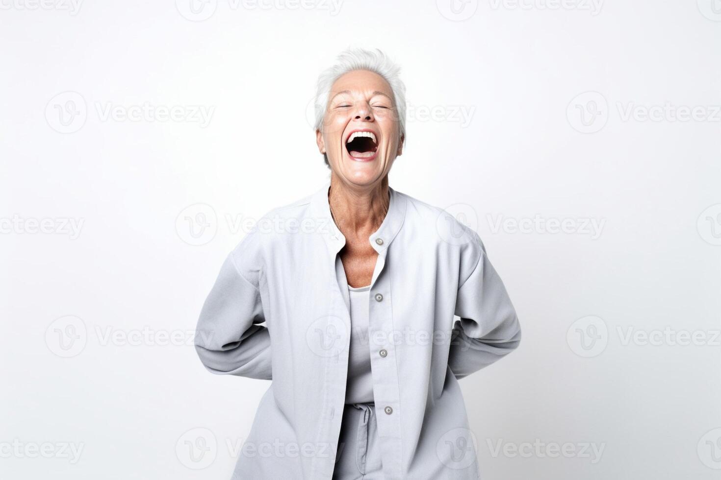 AI Generative Beauty portrait of a senior woman laughing on a white background  Isolated mature lady smiling on a white background photo