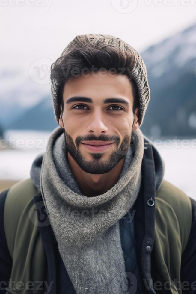 AI Generative Handsome man hiker taking a selfie portrait in front of a lake and mountains at winter photo