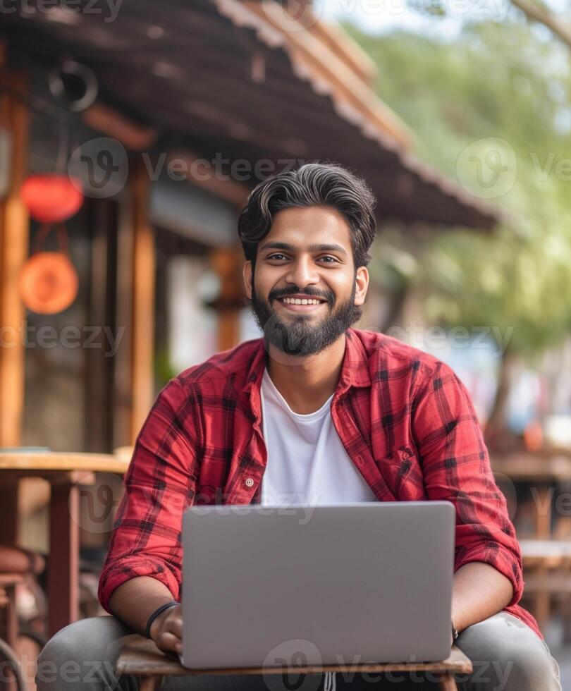 AI Generative Happy male blogger taking a selfie in the park while working on laptop device using wireless internet  Young man university student online learning via computer  Remote work and so photo