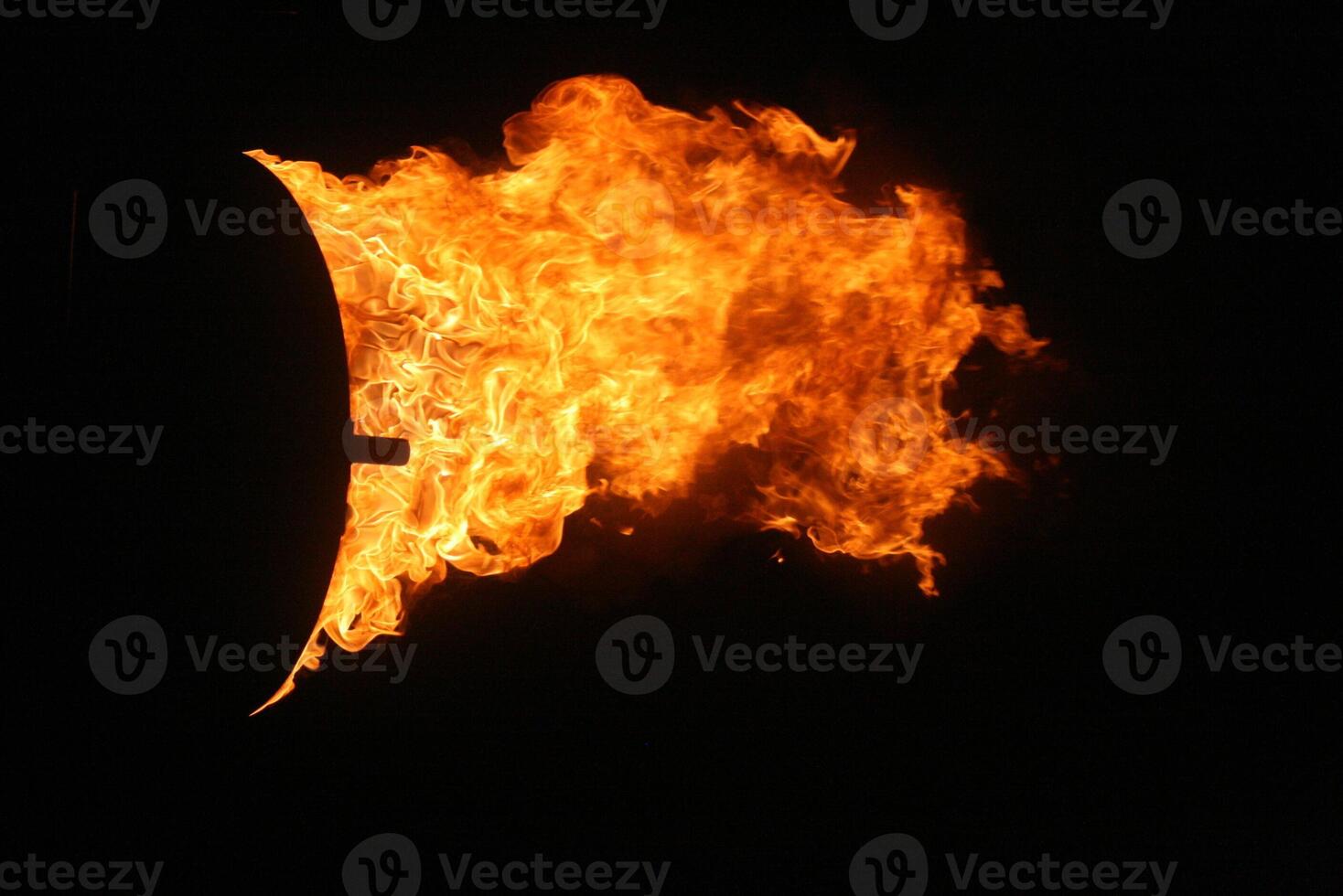 Glowing Blaze Powerful Flaming Torch Illuminating the Dark Night - Dynamic Fire Concept for Design and Creativity Side photo