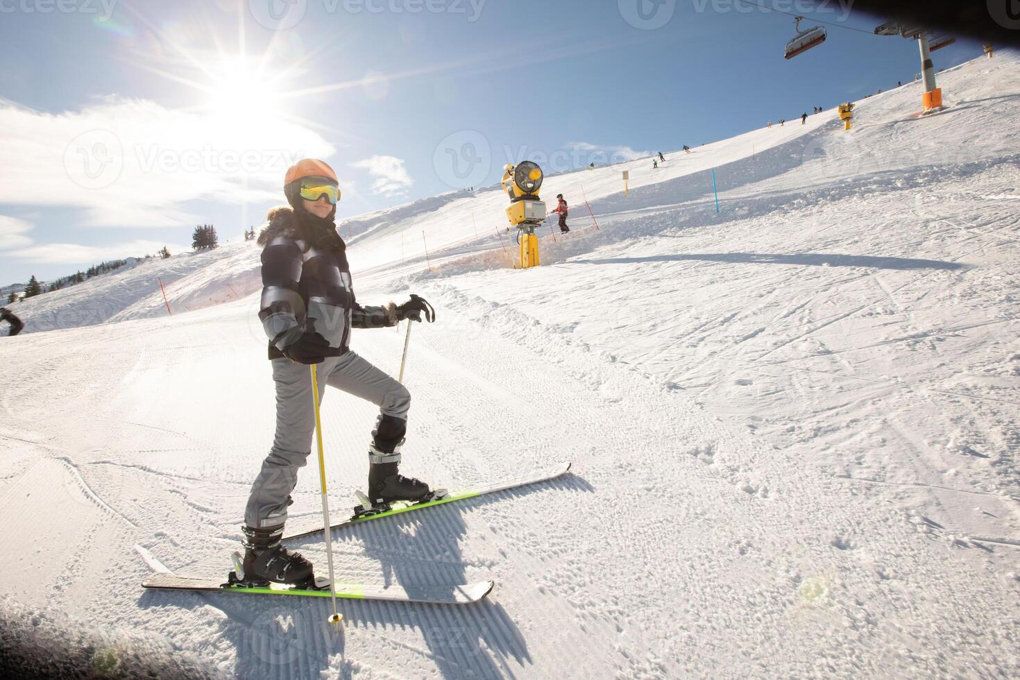 Girl at winter skiing bliss, a sunny day adventure photo