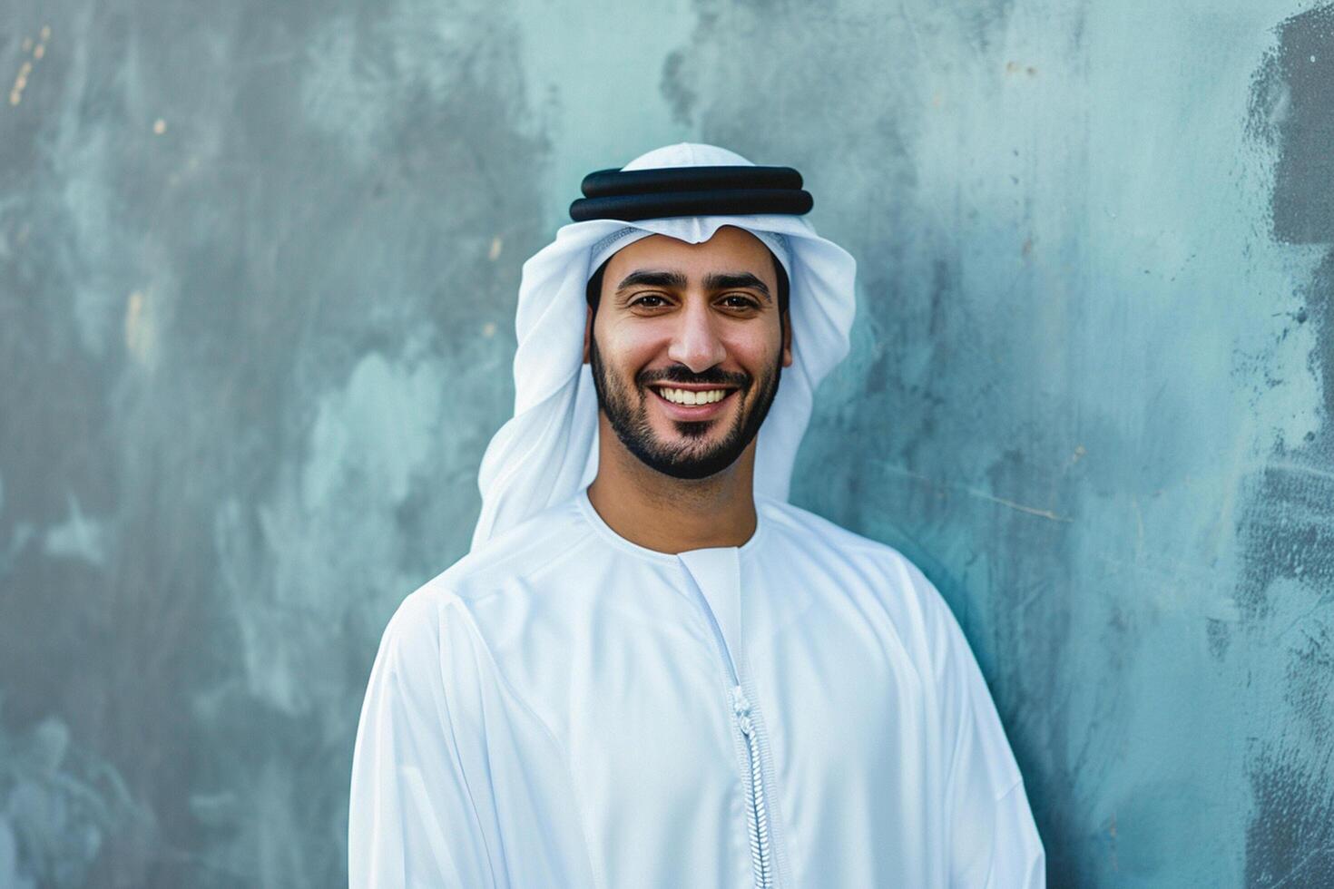 AI generated handsome arabian muslim man wearing white kandura with generative ai photo