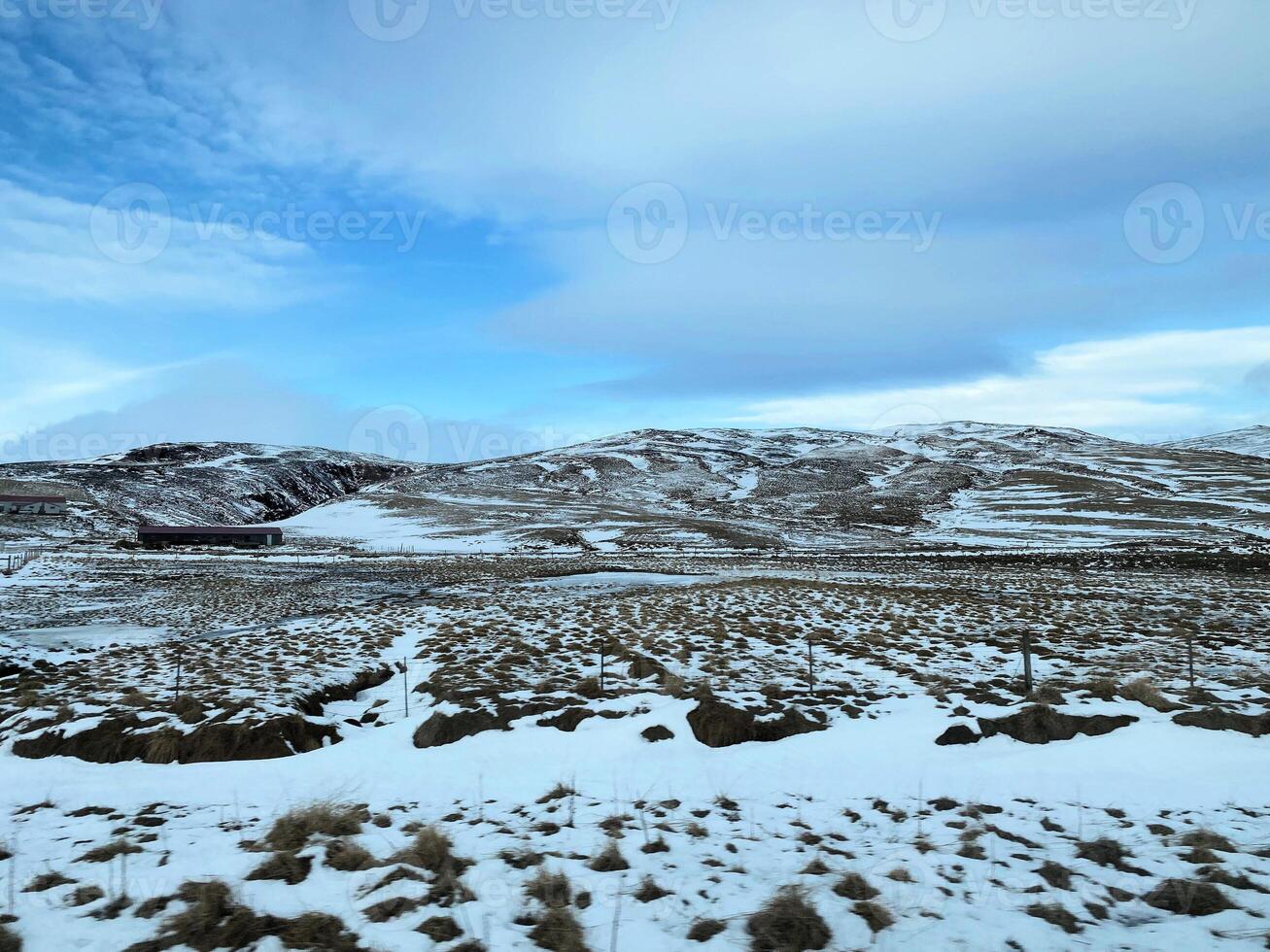 A view of the Iceland Countryside in the winter covered with Snow near the Gulfos Waterfall photo