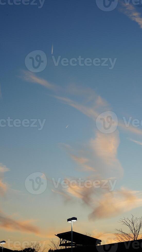 The beautiful sunset view with the colorful clouds and sky as background photo
