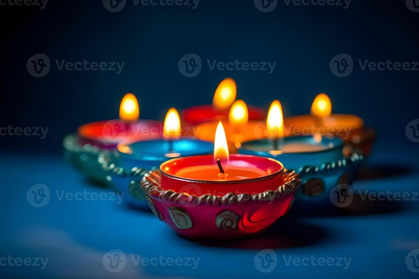 AI generated Happy Diwali - Clay Diya lamps lit on blue background during Diwali celebration, neural network generated photorealistic image photo