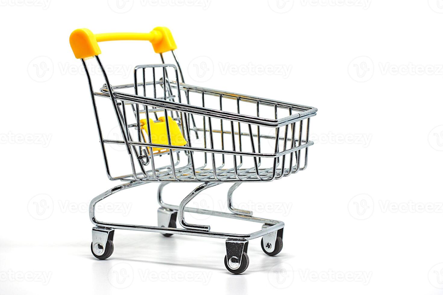Shopping cart or trolley on white color background photo