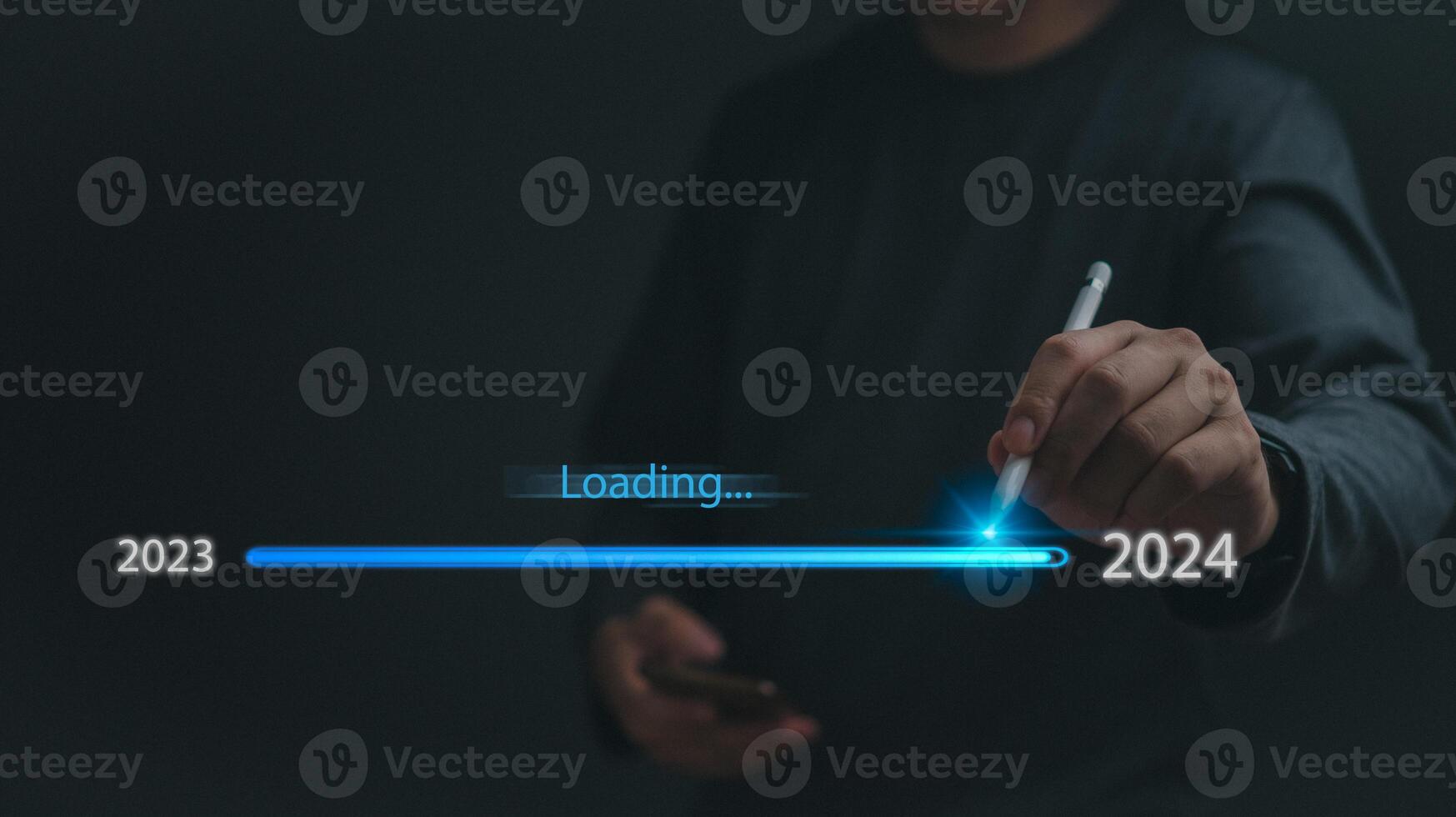 loading progress bar to 2024 Businessman using mobile phone investment and planning marketing finance and target growth success. photo