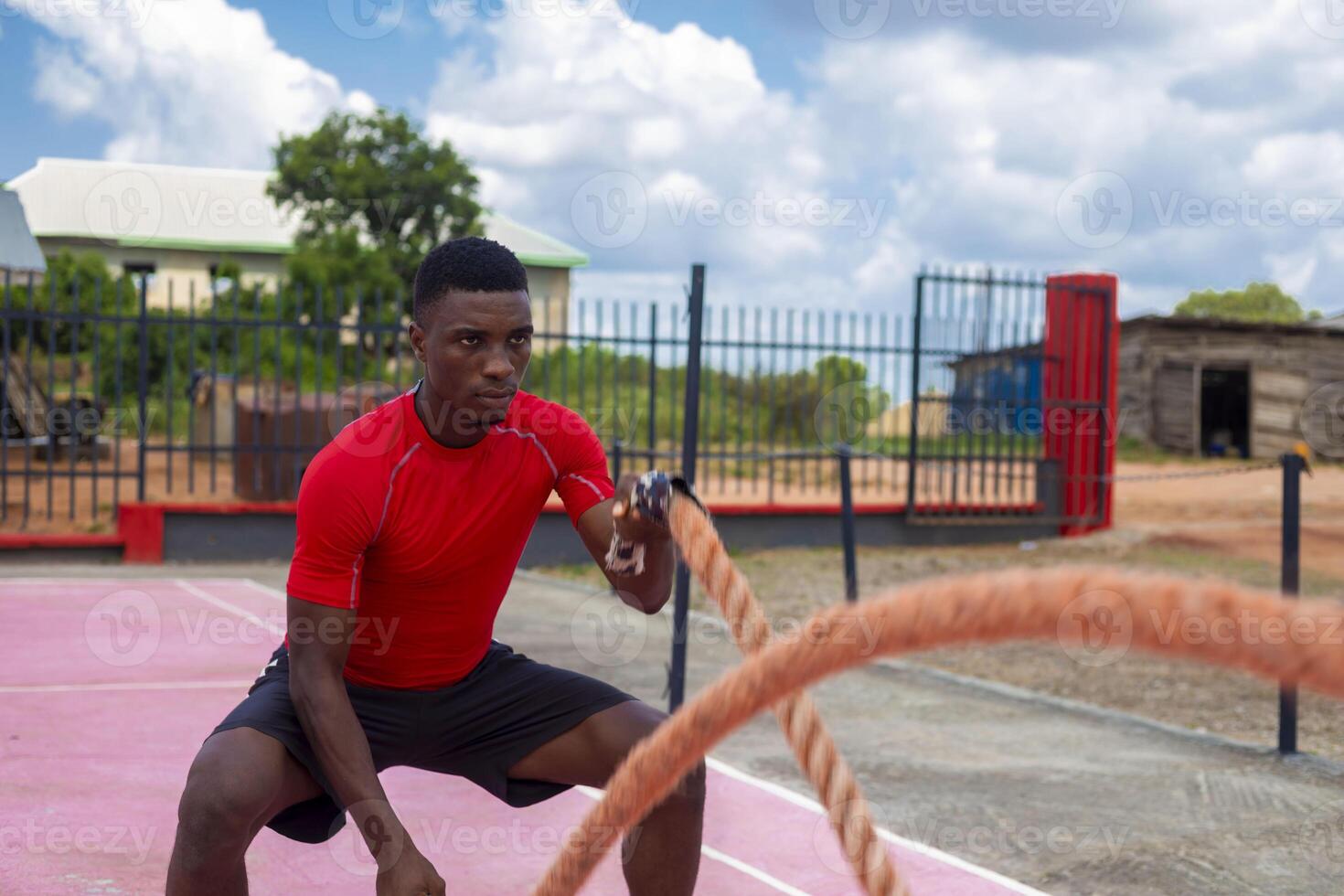 Men with battle rope battle ropes exercise in the fitness gym. CrossFit concept. gym, sport, rope, training, athlete, workout photo