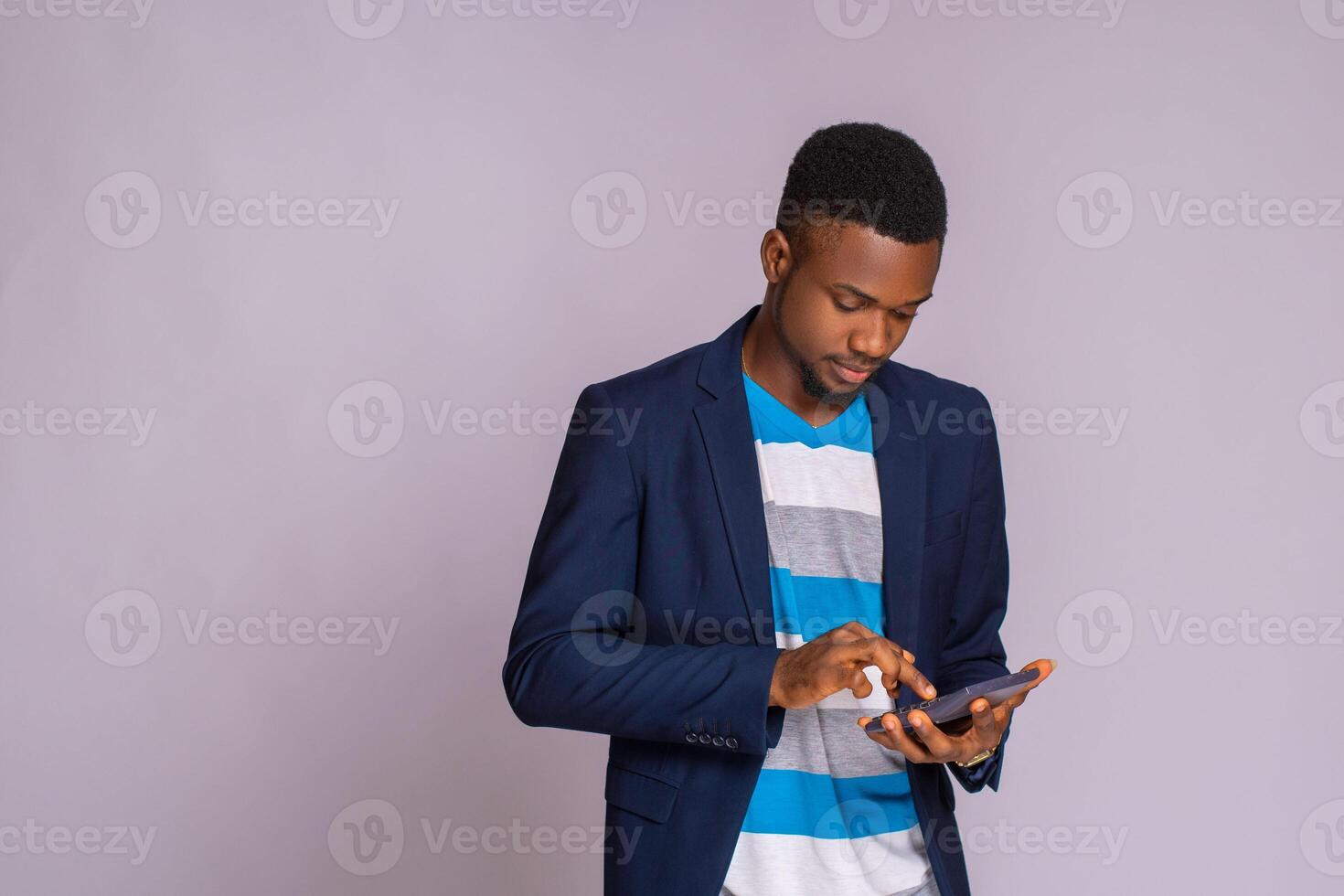 businessman using a calculator to calculate is spending photo