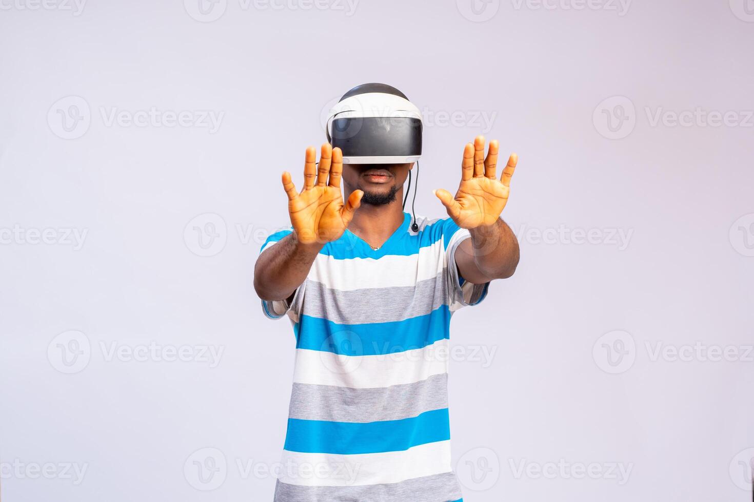 Young man using virtual reality headset. VR, future, gadgets, technology concept photo