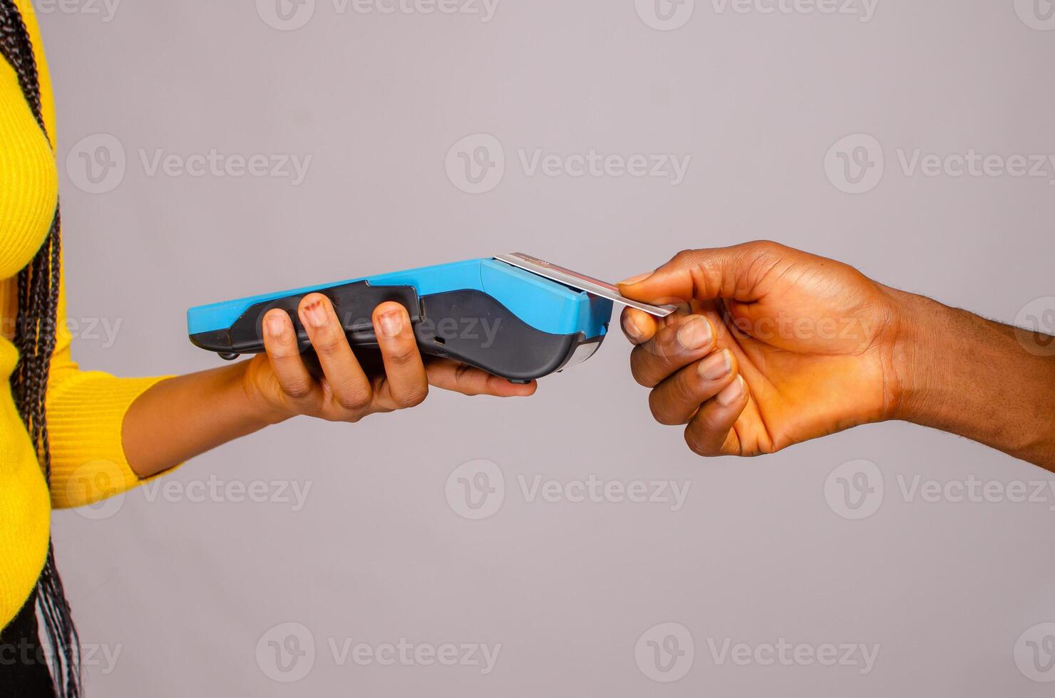 customer making payment with card using point of sales photo
