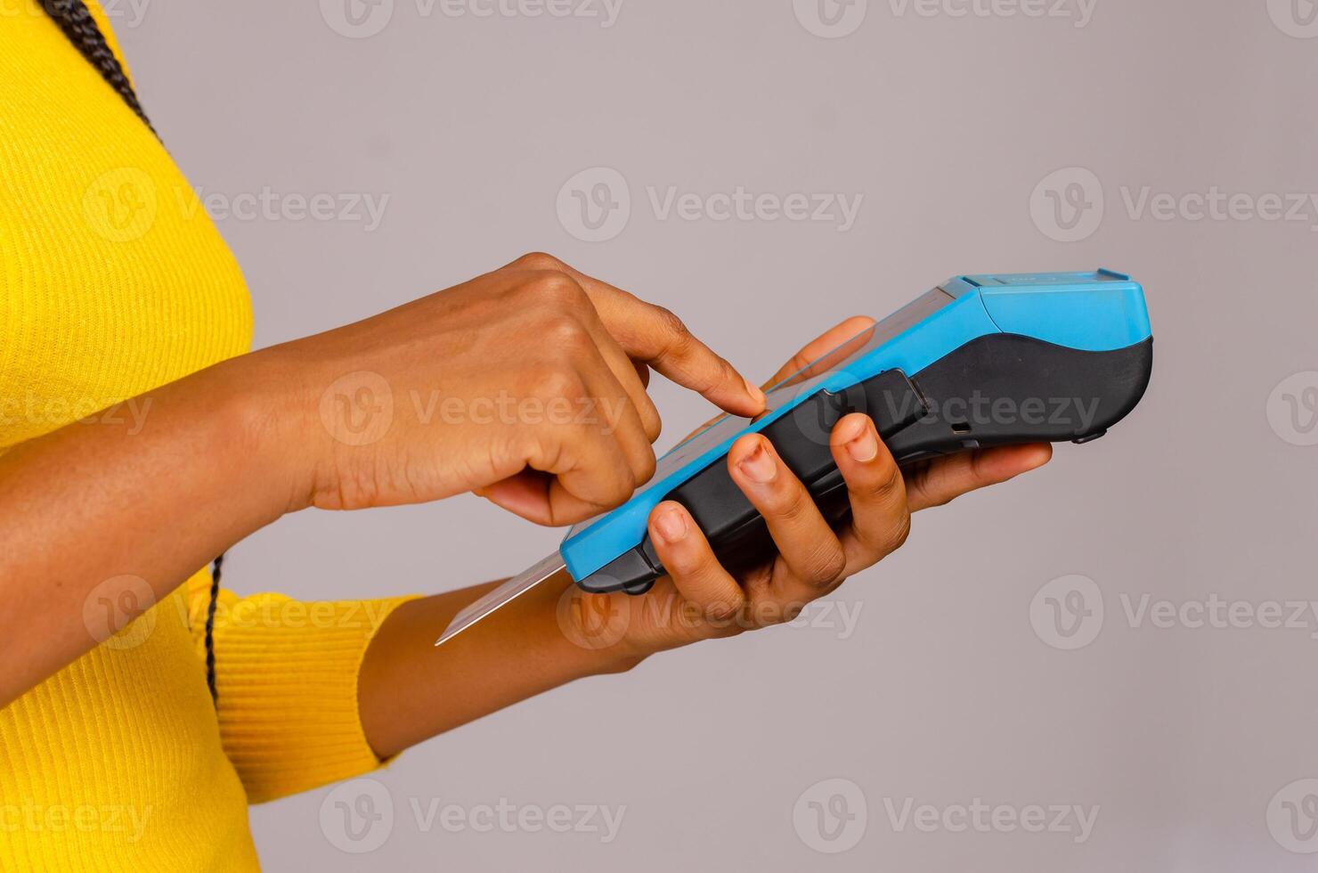 woman hand paying with smartphone on credit card pos terminal photo