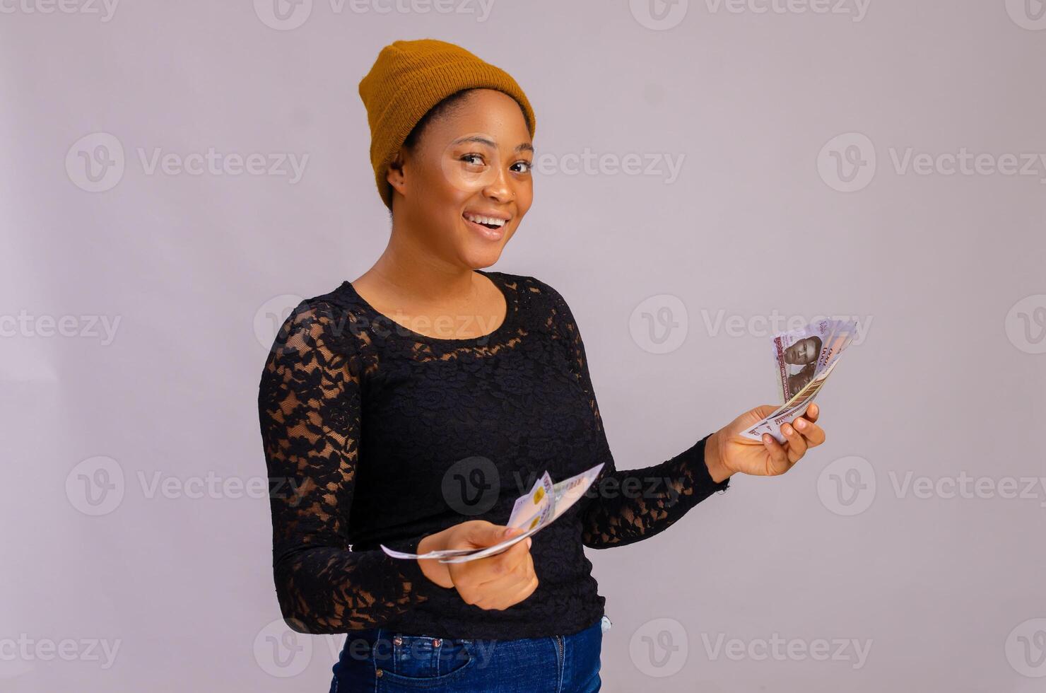 lady isolated over white background holding money and giving out money photo