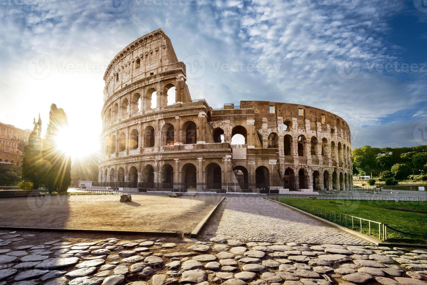 Colosseum in Rome and morning sun, Italy photo