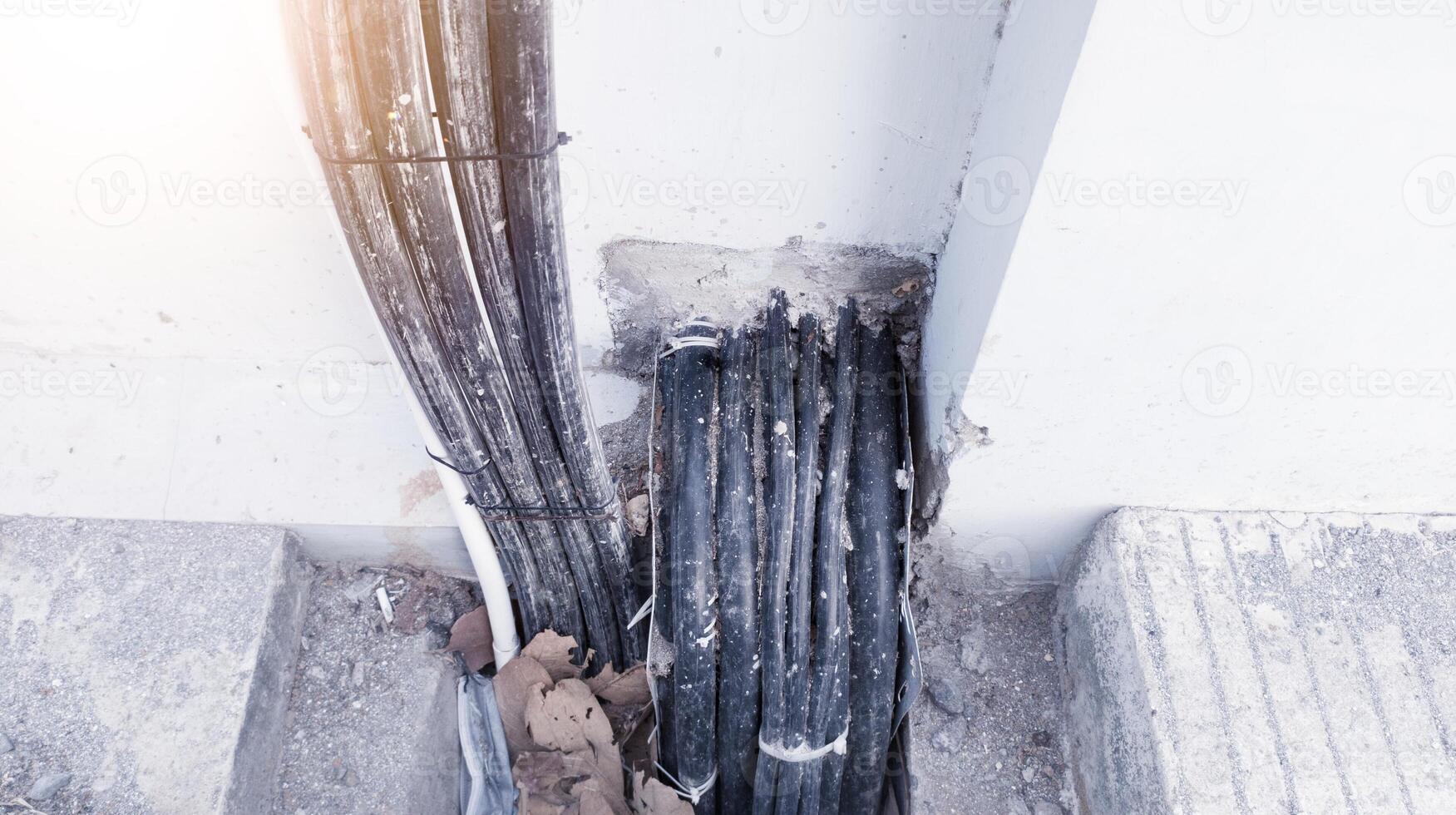 Installation of electrical cables out door, High low voltage  cables in out door building. photo
