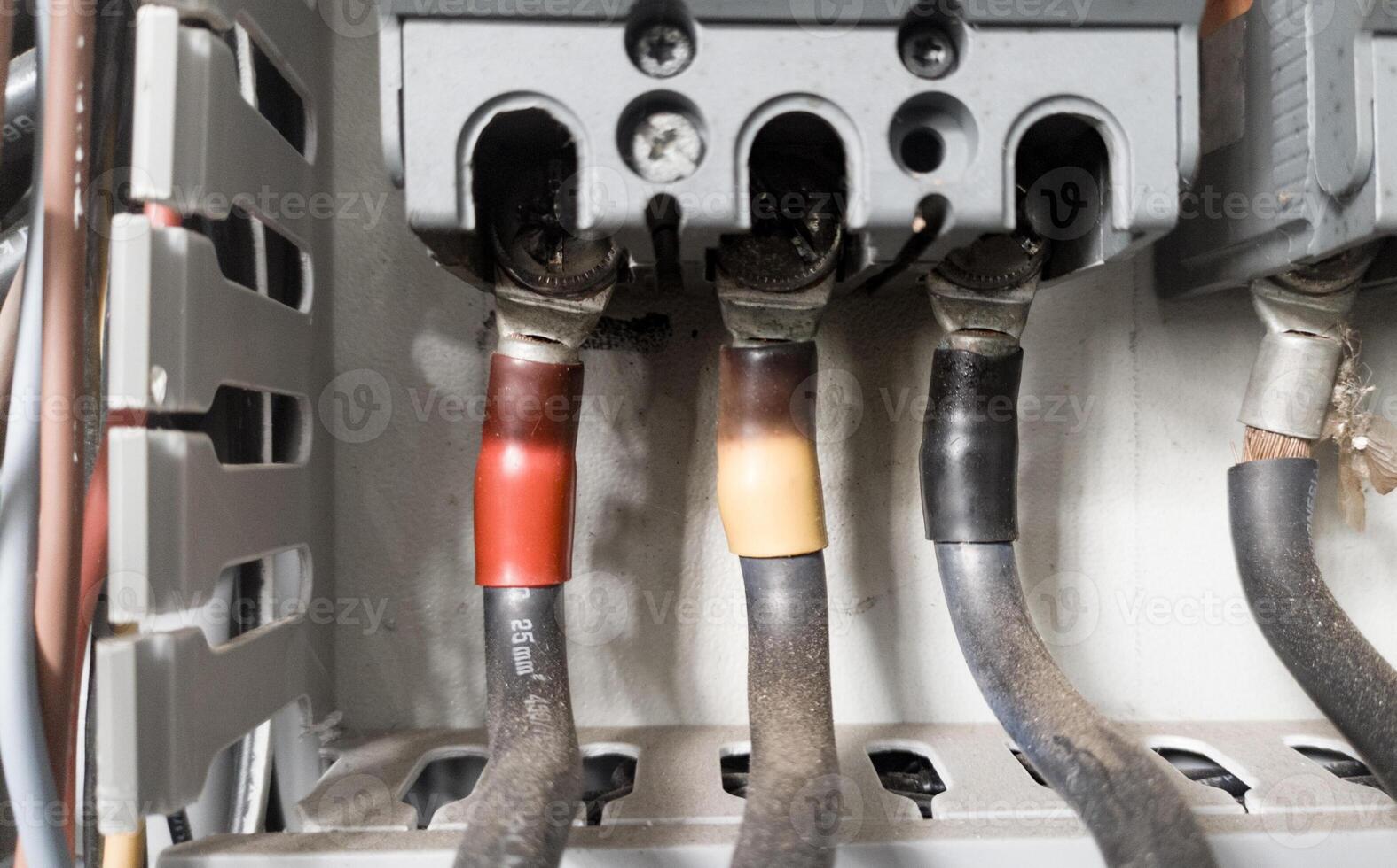 The power cable burns and peels due to overload and results in overheating. photo