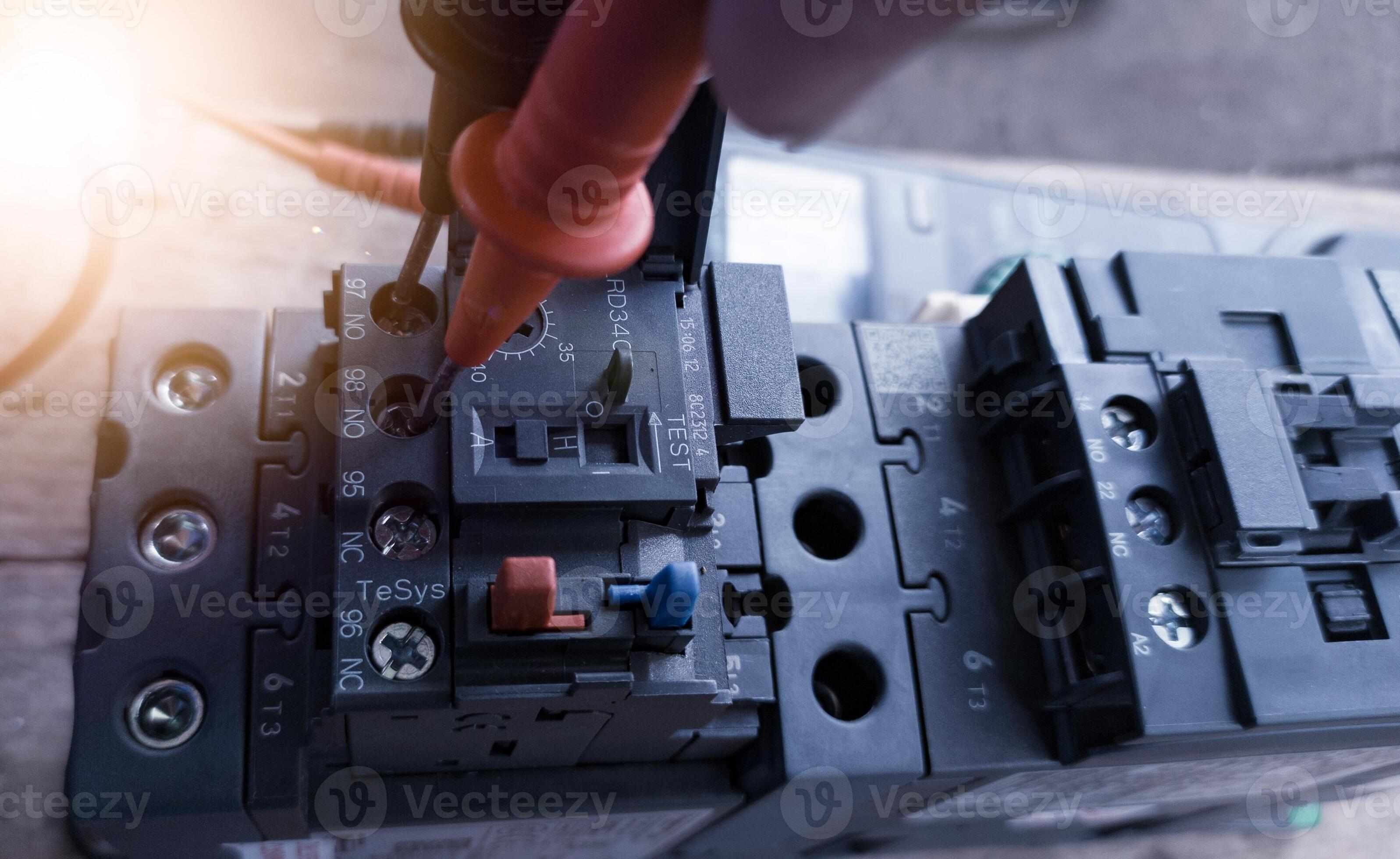 Checking contactor terminals using a multimeter,