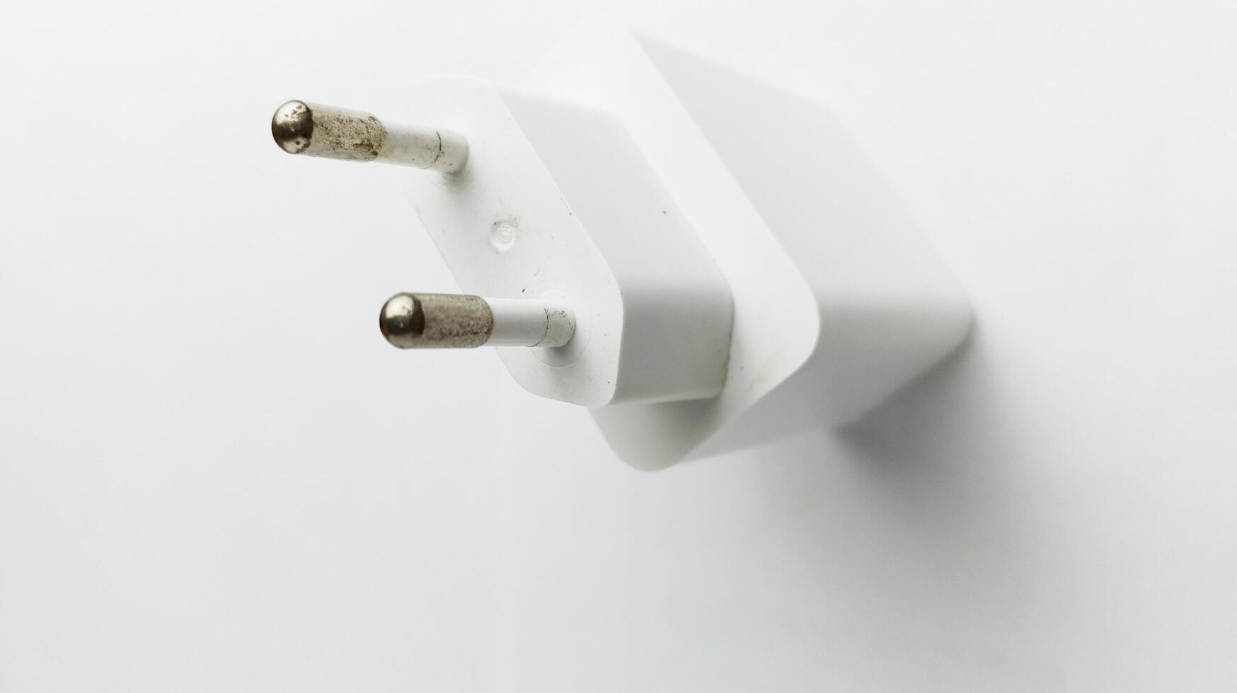 Universal plugs adapters on white background photo