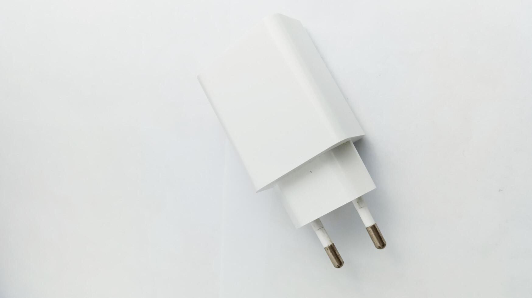 Universal plugs adapters on white background photo