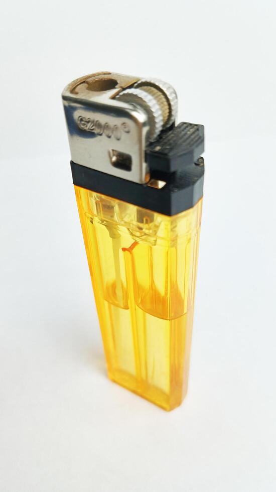 Cigarette gas lighter, isolated on white background photo