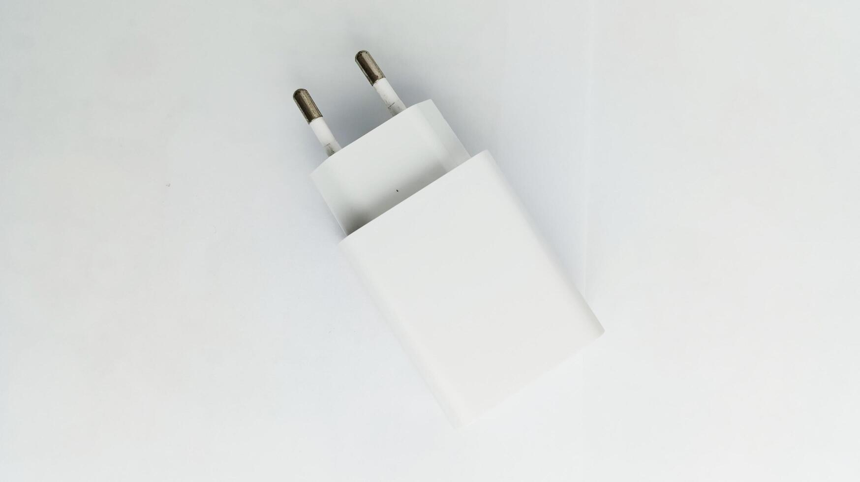 Universal plugs adapters on white background photo