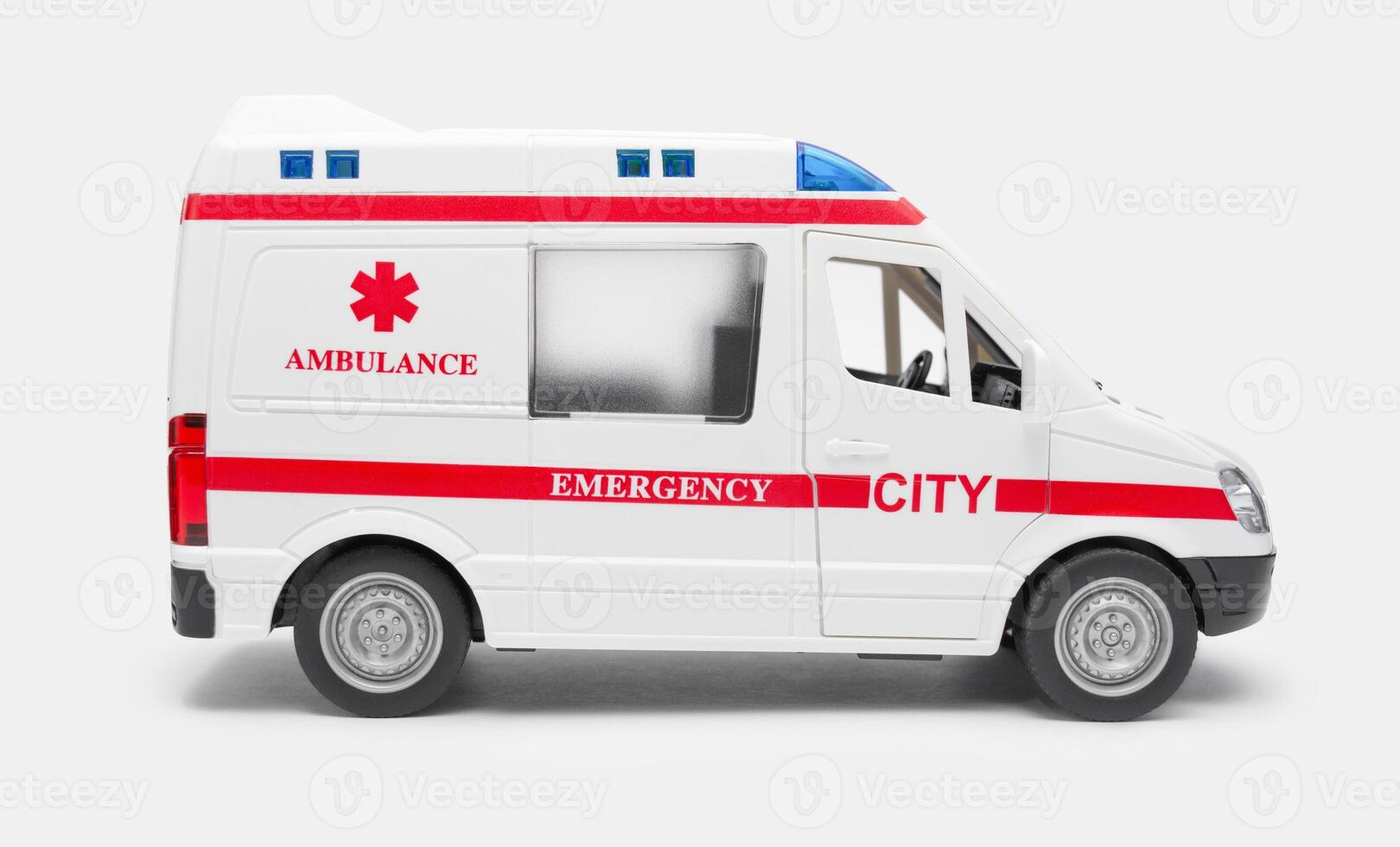 Toy ambulance on a white background. Healthcare concept photo