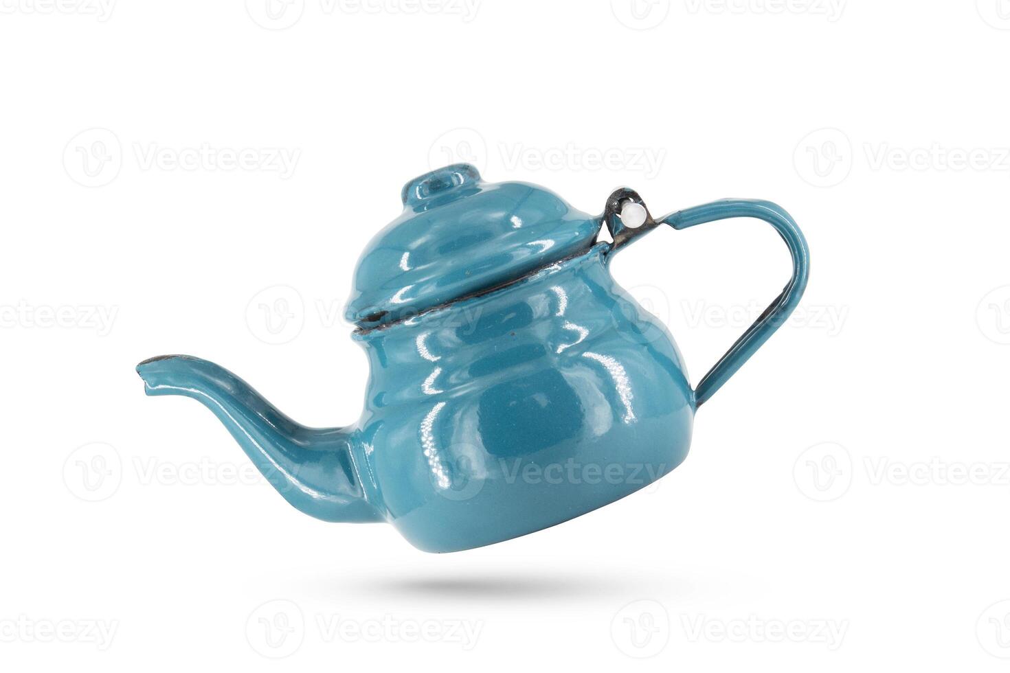 Vintage metal old blue kettle isolated on white background photo