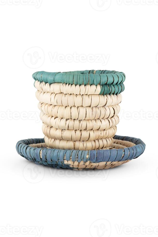Rattan cup and coaster - bamboo wicker isolated on white background photo