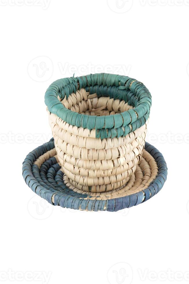Rattan cup and coaster - bamboo wicker isolated on white background photo