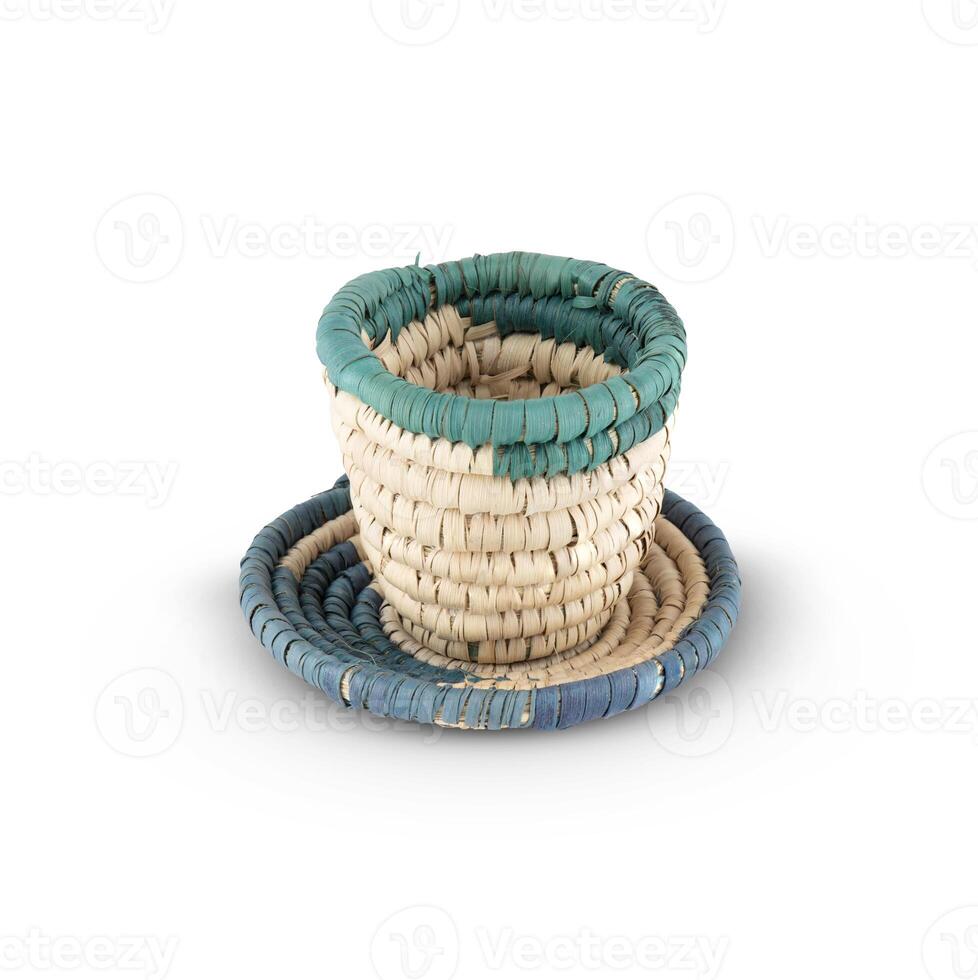 Rattan cup and coaster - bamboo wicker isolated on white background photo