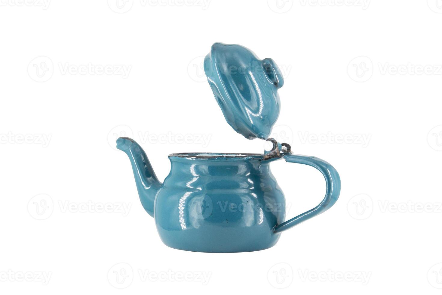 Vintage metal old blue kettle isolated on white background photo
