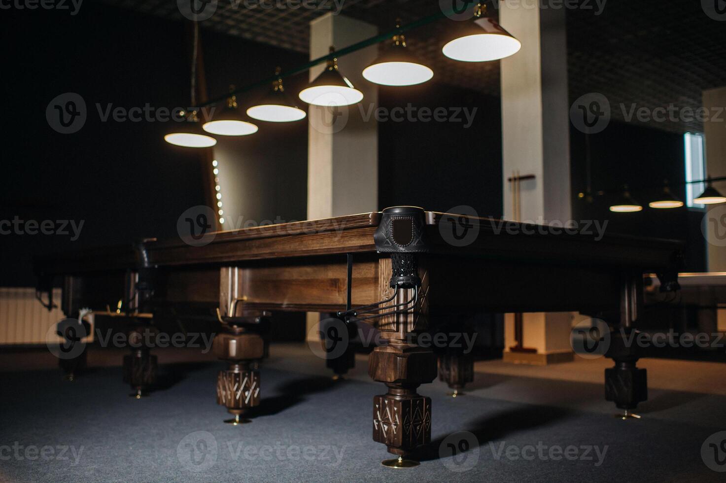 Oak unusual Billiard table in a billiard club.Bottom view photo