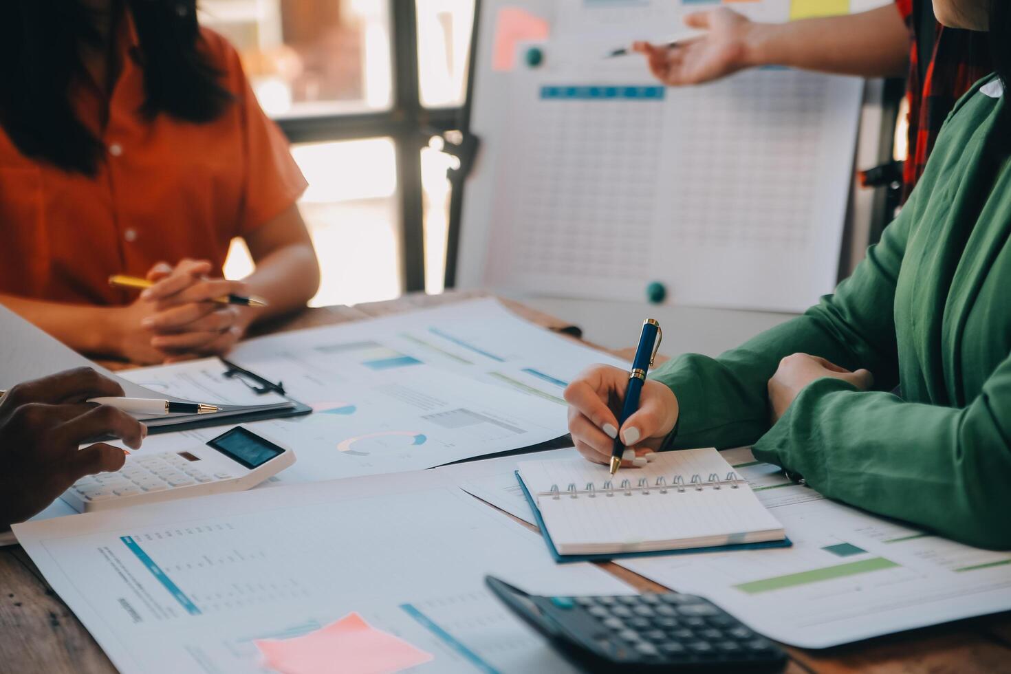 Co working conference, Business team meeting present, investor colleagues discussing new plan financial graph data on office table with laptop and digital tablet, Finance, accounting, investment. photo