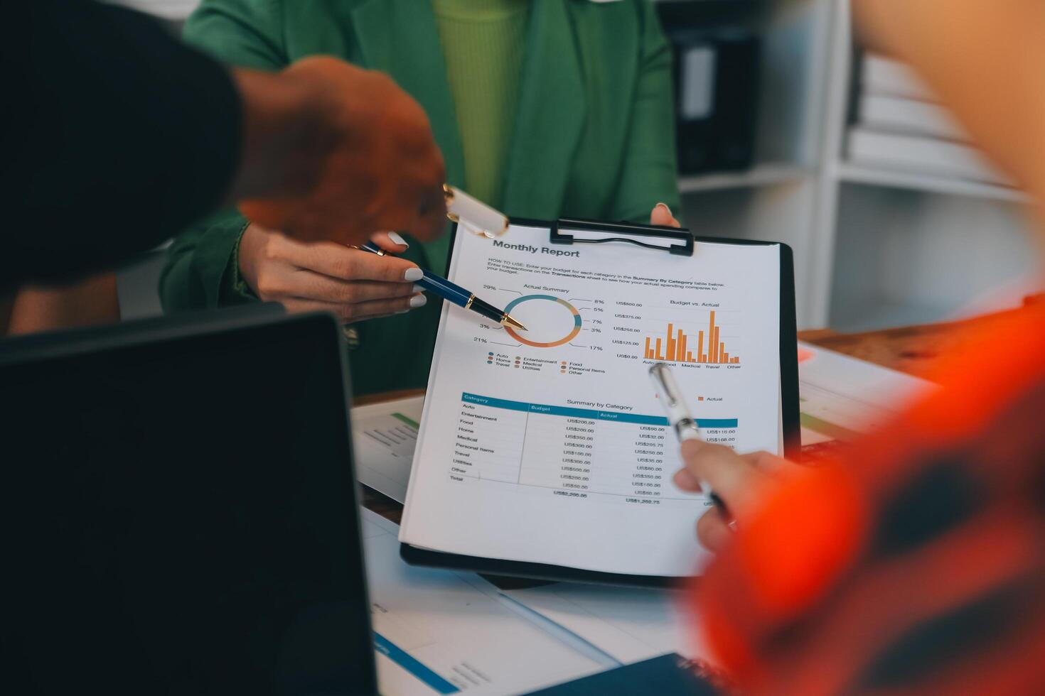 Co working conference, Business team meeting present, investor colleagues discussing new plan financial graph data on office table with laptop and digital tablet, Finance, accounting, investment. photo