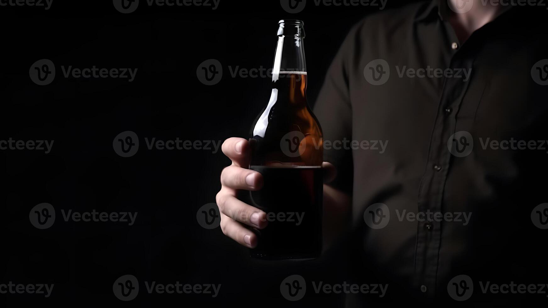 AI generated close up of caucasian man holding a brown bottle of beer in his hand on black background, neural network generated photorealistic image photo