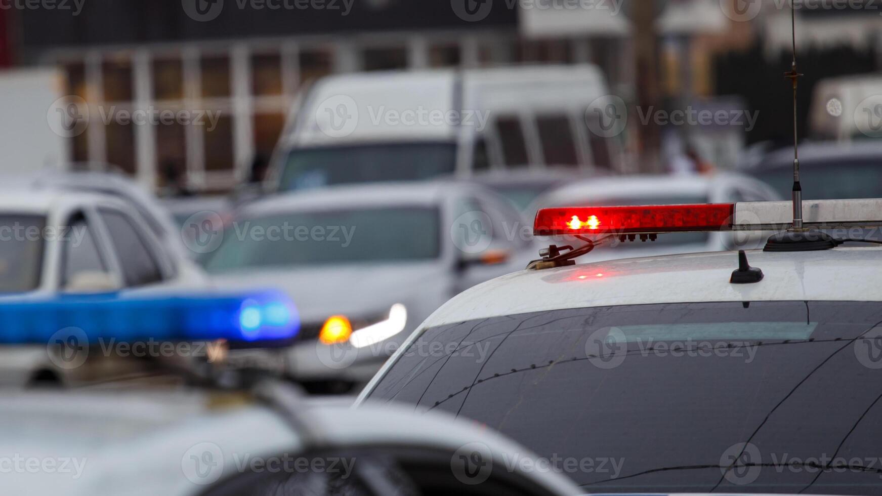 police cars lights at the city street at cloudy day photo