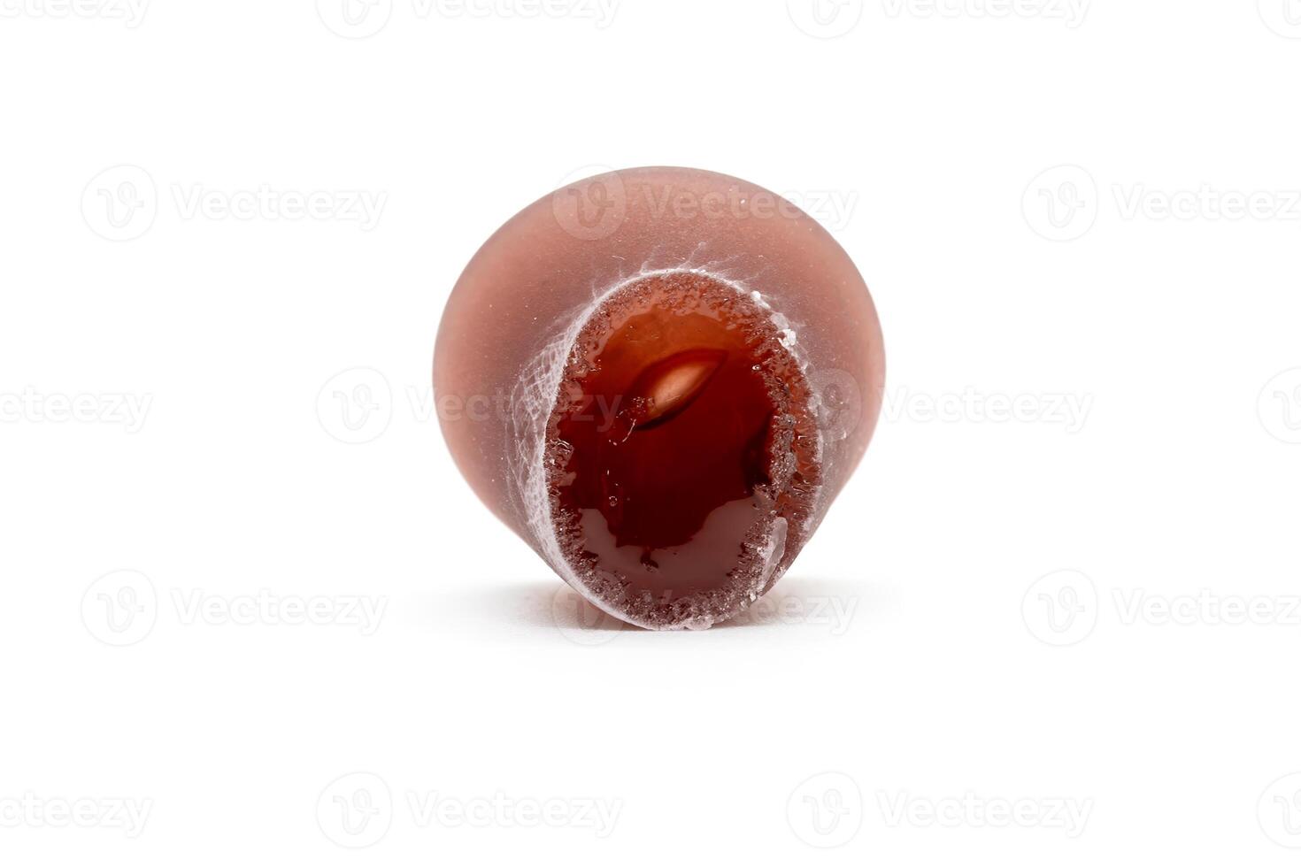 Closeup of cuberdon, a cone-shaped Belgian candy on a white background photo