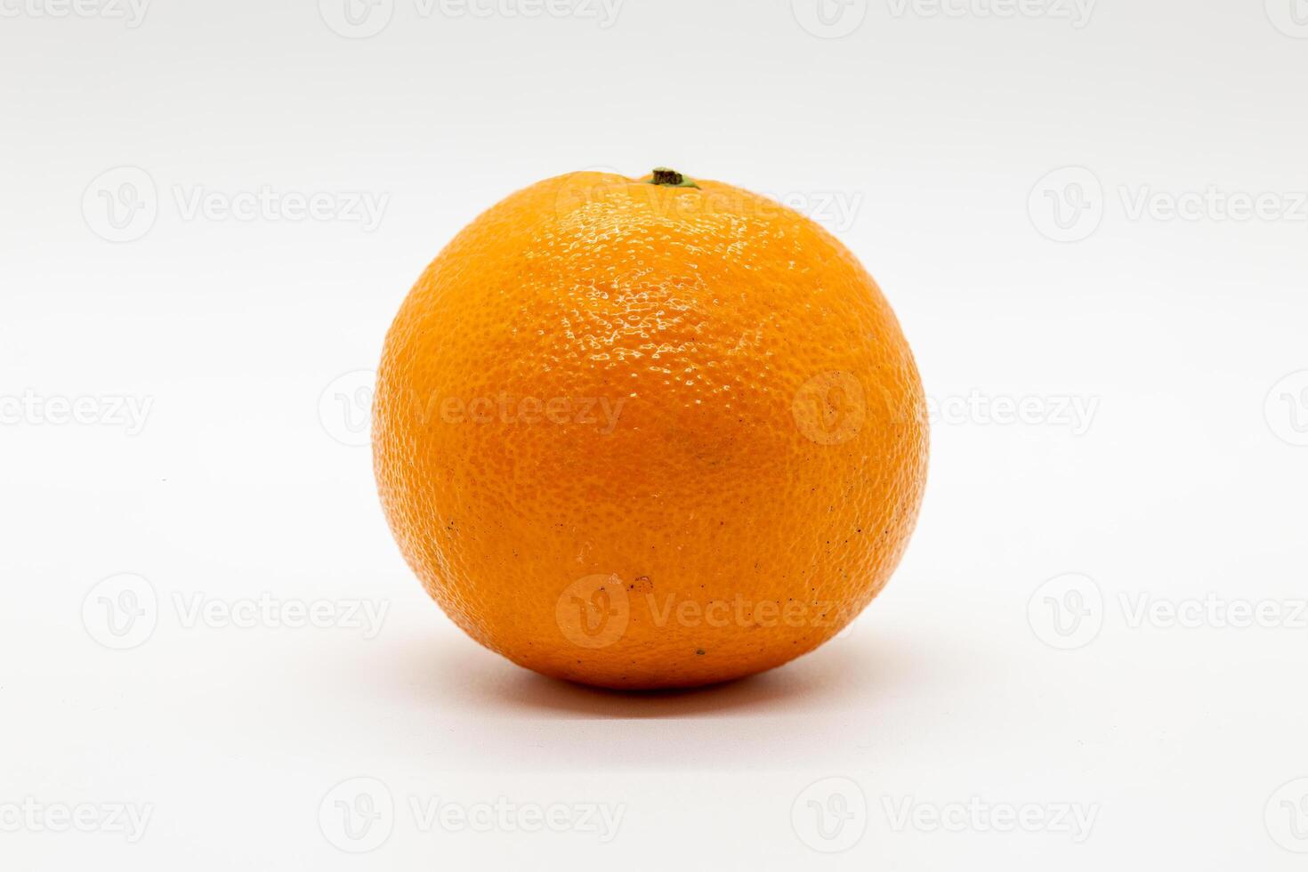 Closeup of a tangerine on a white background photo