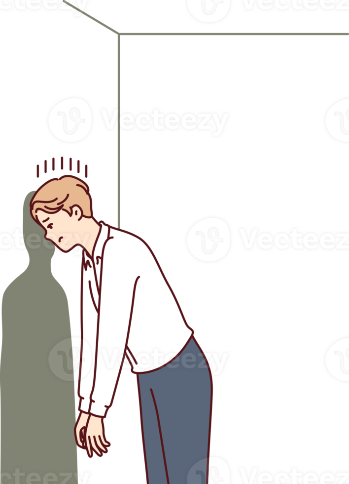 Depressed man in hopeless situation is banging head against wall trying to come up with original solution to problem. Guy victim of hopeless situation needs psychological support or advice png
