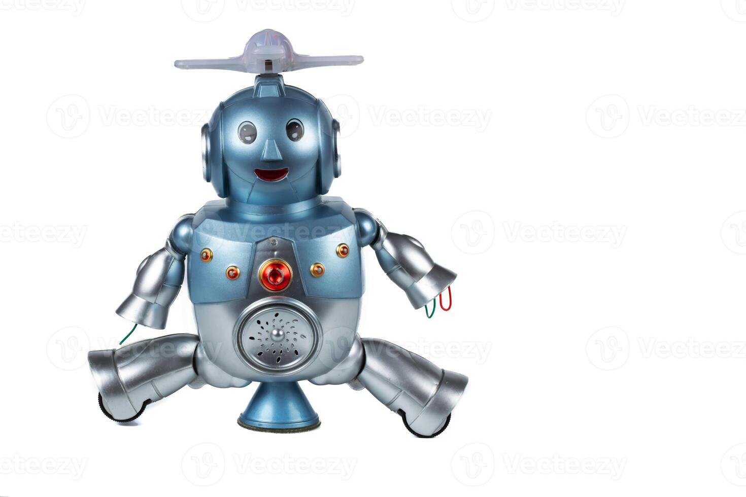 Vintage toy robot on a white background. Robotics. photo