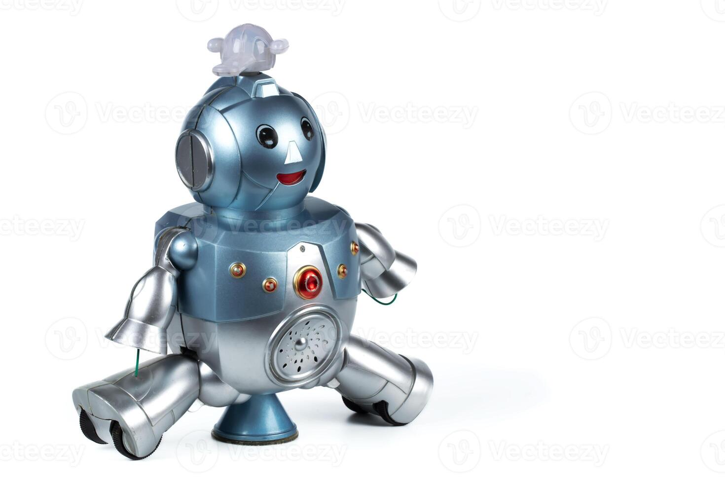 Vintage toy robot on a white background. Robotics. photo